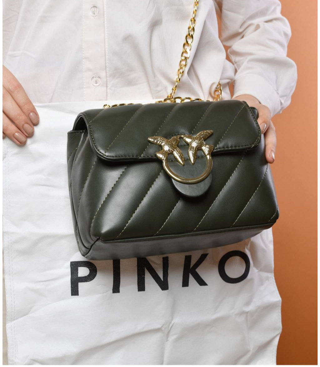 gold accessorized trendy bag