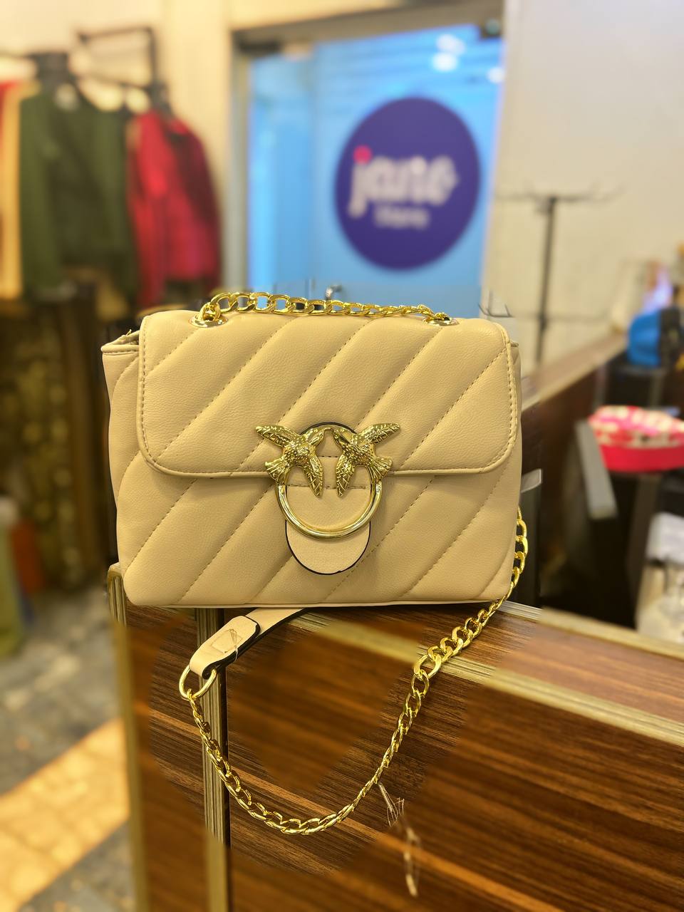 gold accessorized trendy bag