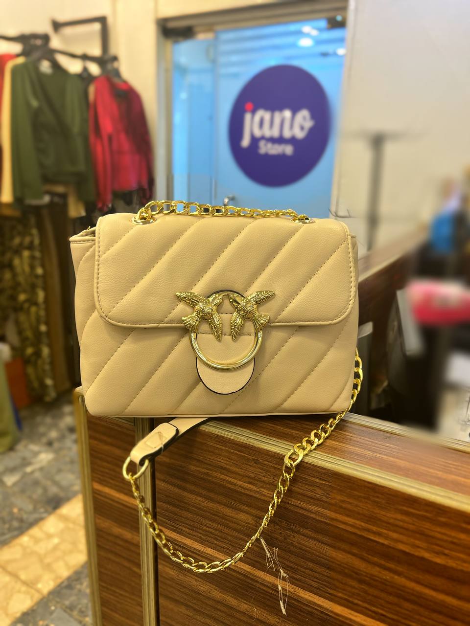 gold accessorized trendy bag