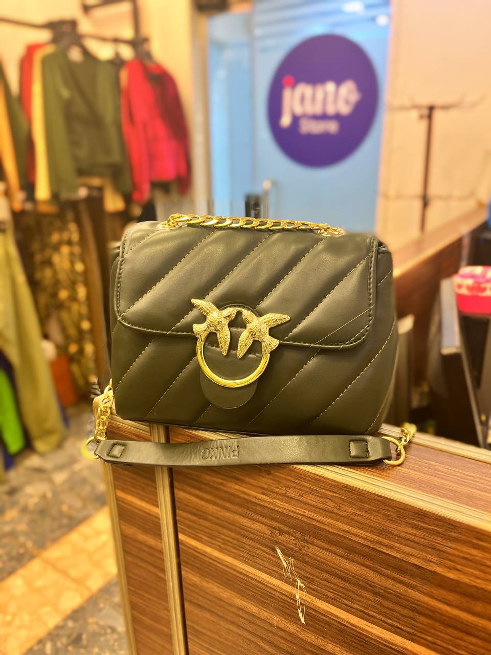 gold accessorized trendy bag
