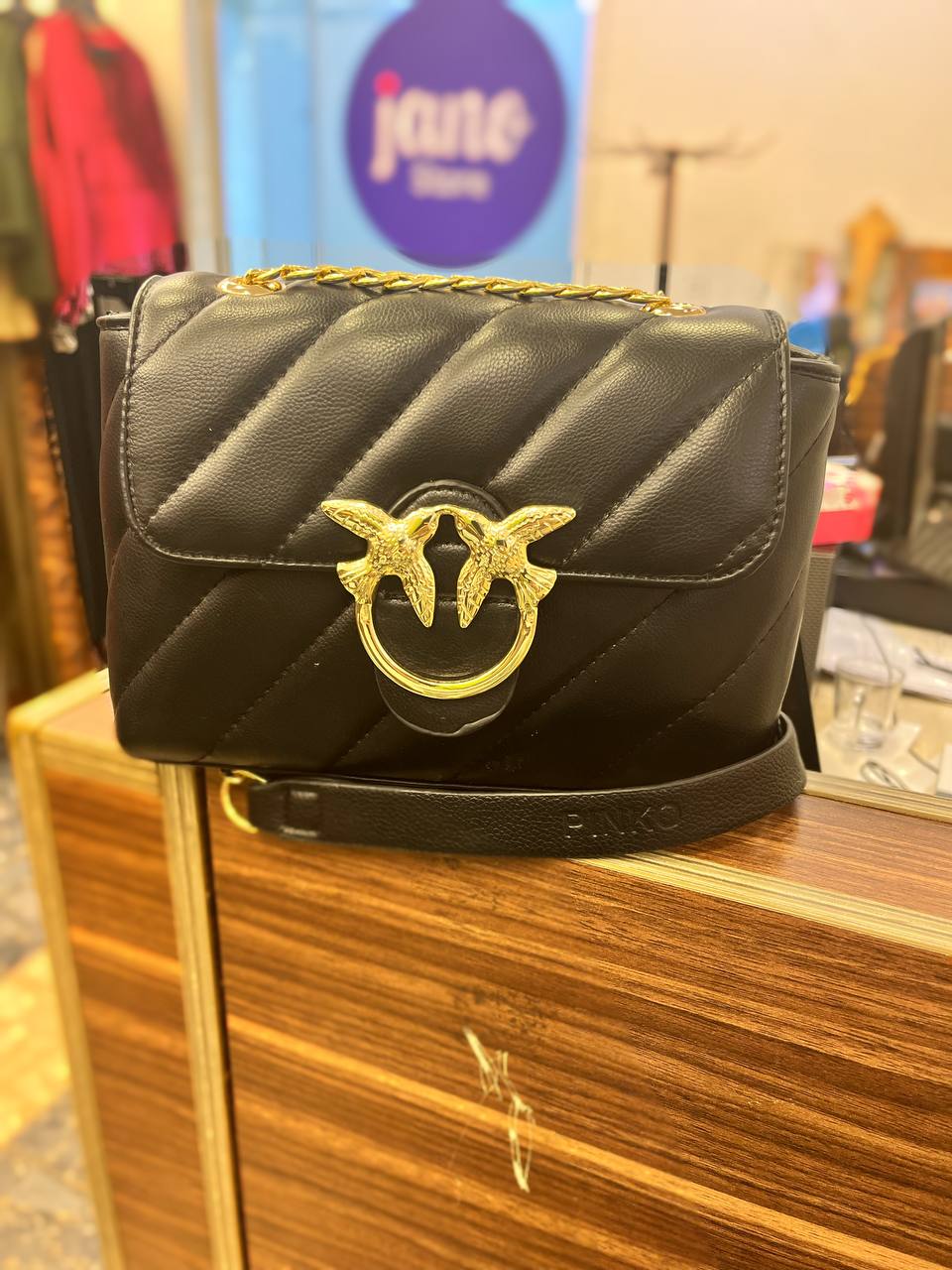 gold accessorized trendy bag