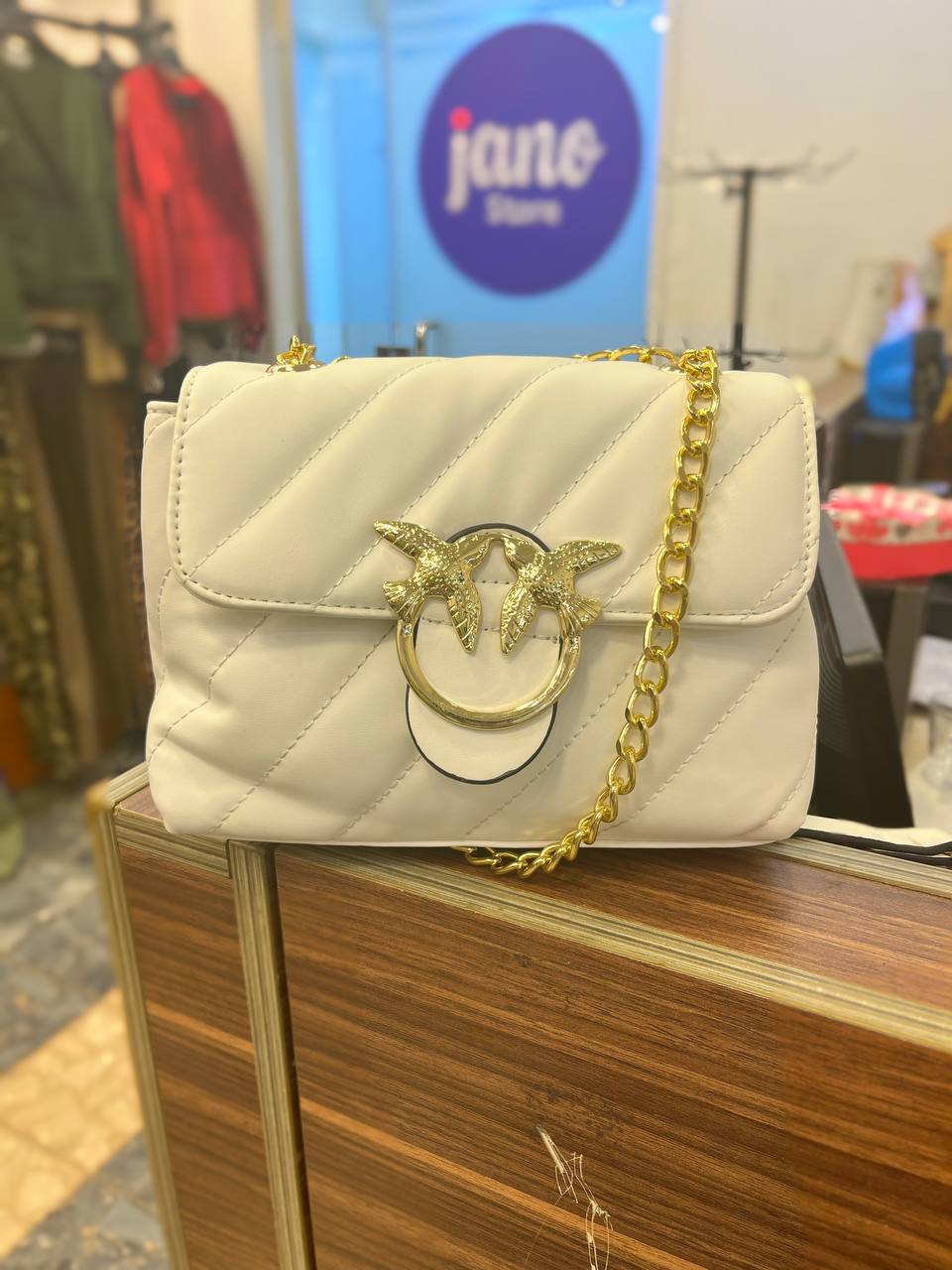 gold accessorized trendy bag