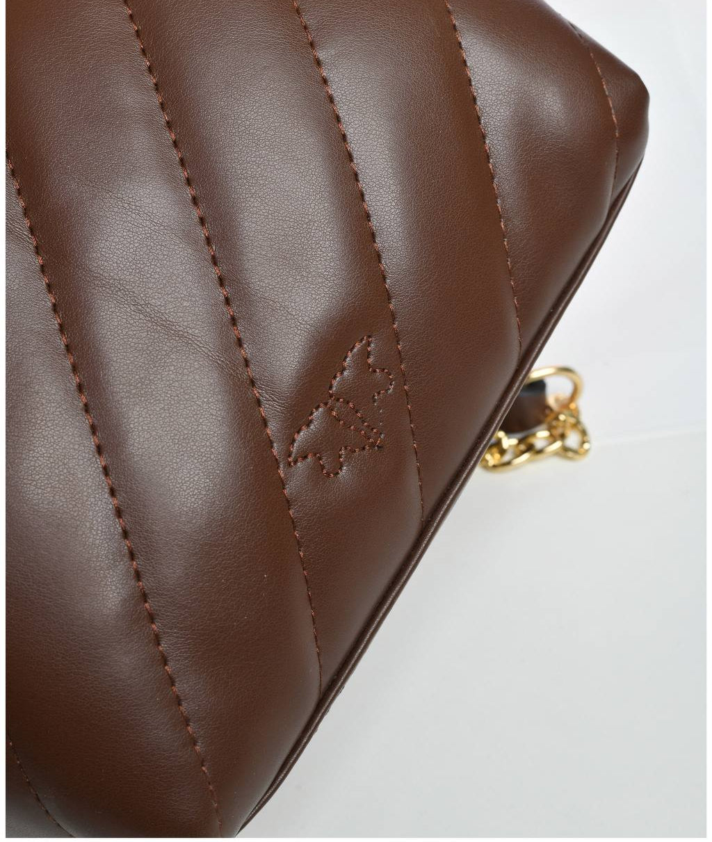 gold accessorized trendy bag