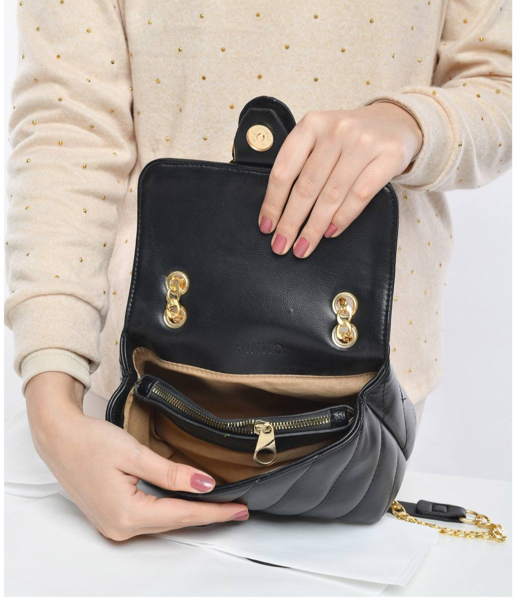 gold accessorized trendy bag
