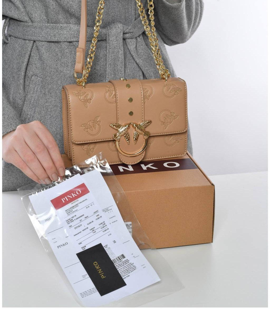 trendy gold accessorizes bag