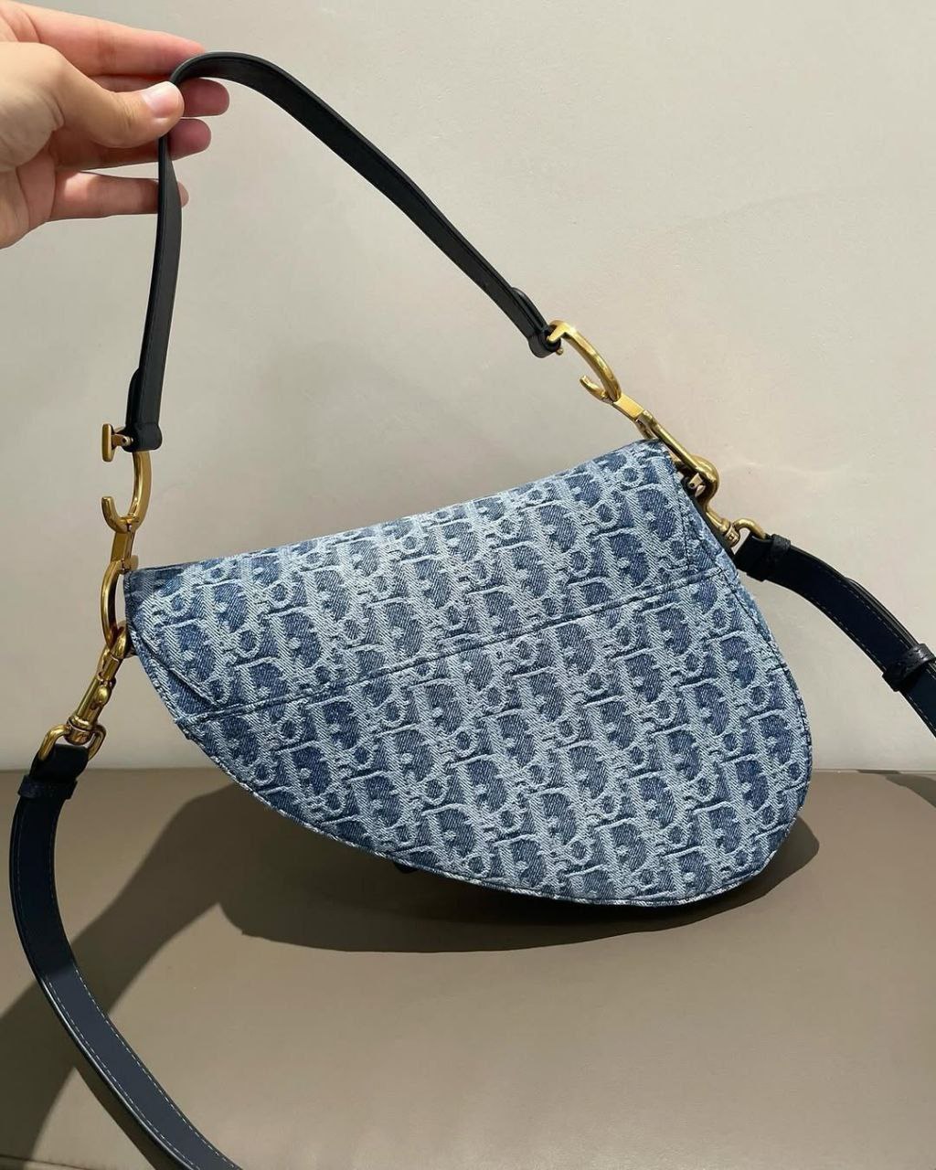 the iconic blue Oblique canvas design with signature “D” hardware in gold-tone metal ( Mirror )