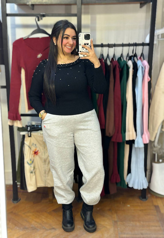 Basic Knit Top with Ruffled Neckline & Pearl Detail